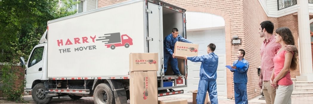 10 Questions That Every Client Should Ask Removalist Company 2 Professional movers from Harry The Mover in Melbourne efficiently loading and unloading moving boxes from a truck, ensuring a smooth and secure relocation process.